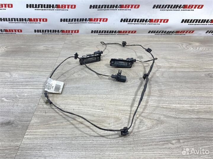 Фонарь подсветки номера VW Пассат Б6