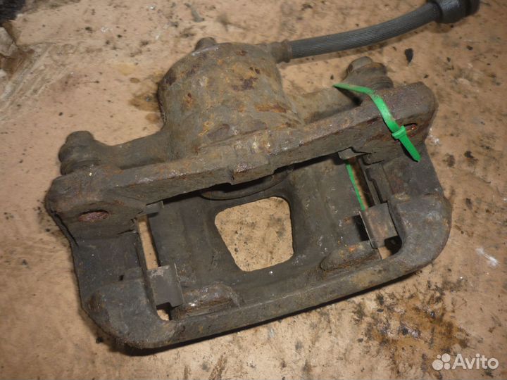 Суппорт передний левый Шевроле Авео Т250