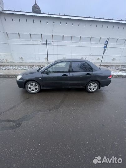 Mitsubishi Lancer 1.3 МТ, 2003, 310 000 км