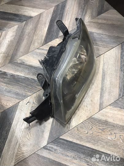 Фара левая Mitsubishi Outlander