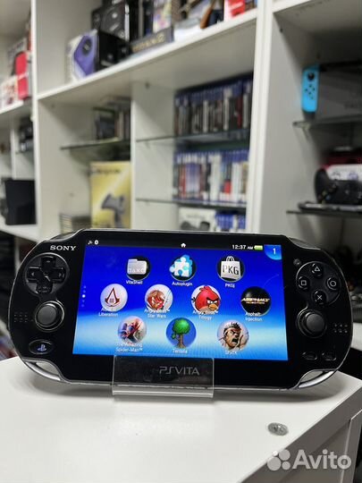 Sony ps Vita 64 гб + 19 игр