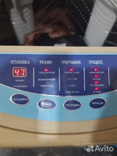 Стиральная машина с вертикальной загрузкой