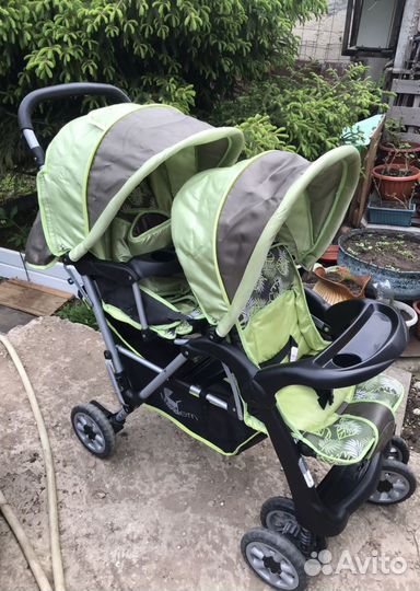 Двухместная прогулочная коляска
