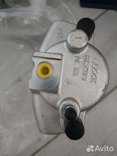 Суппорт тормозной Додж караван 3,3