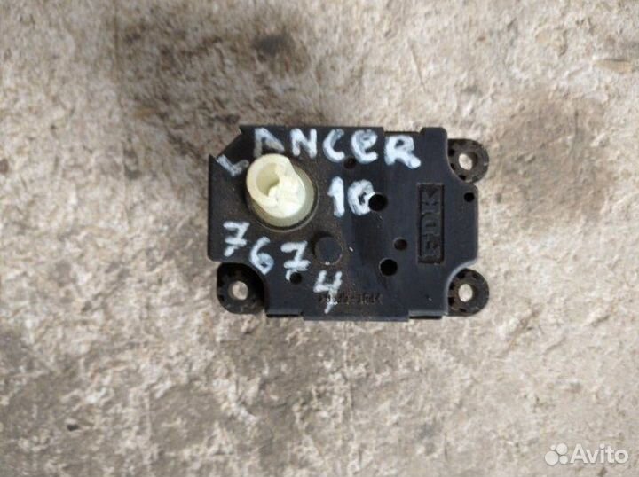 Сервопривод заслонки отопителя Mitsubishi Lancer