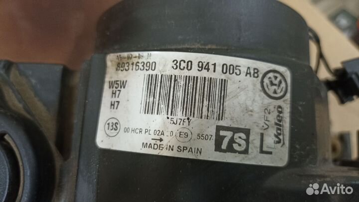 Фара левая WV Passat B6