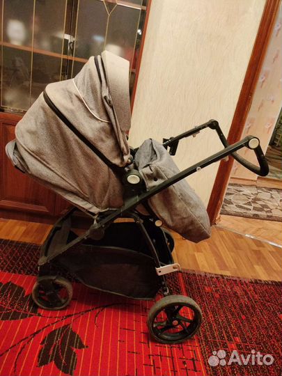 Прогулочная коляска с реверсивным блоком