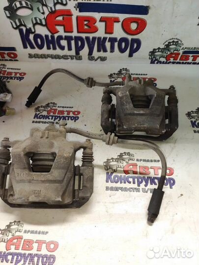 Суппорт тормозной передний правый Chevrolet Cruze