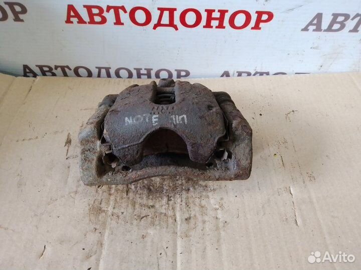 Суппорт тормозной передний правый Nissan Note E11