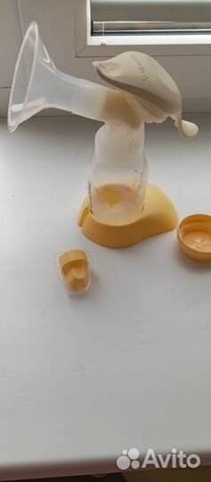 Молокоотсос medela ручной