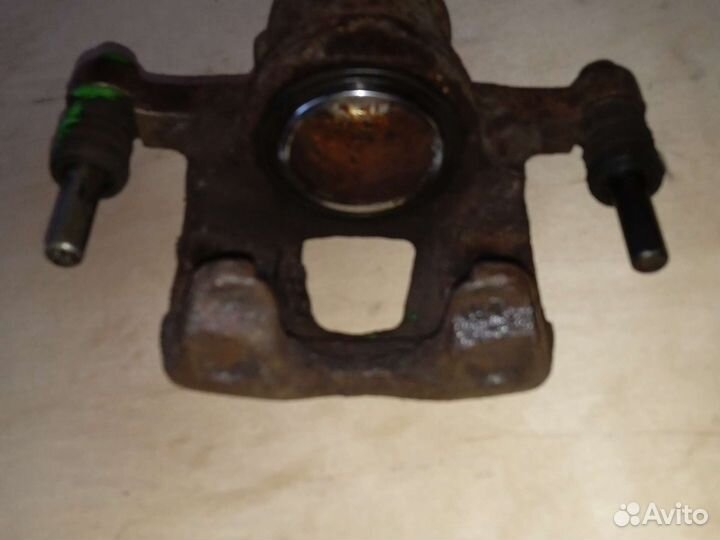 Тормозной суппорт передний левый Daewoo Matiz 0,8