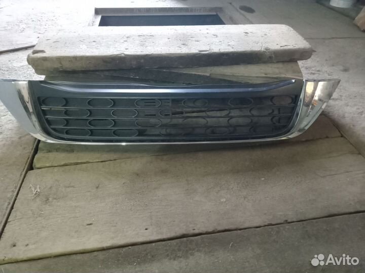 Решетка радиатора верхняя и левое крыло