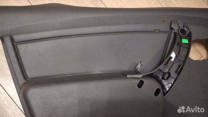 Обшивка (карта) двери передняя левая Renault