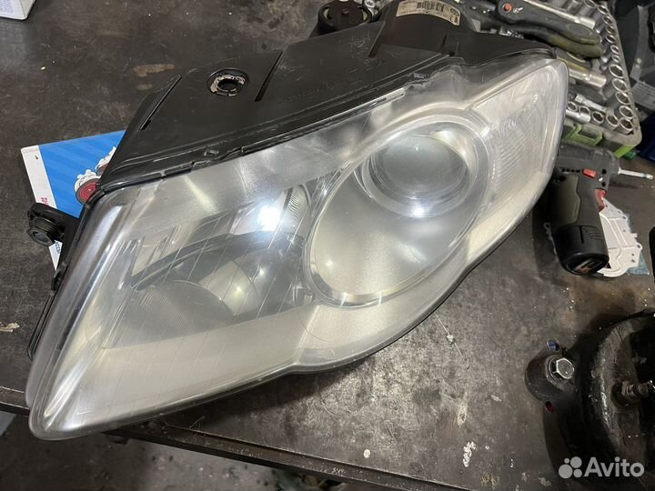 Фара volkswagen passat b6