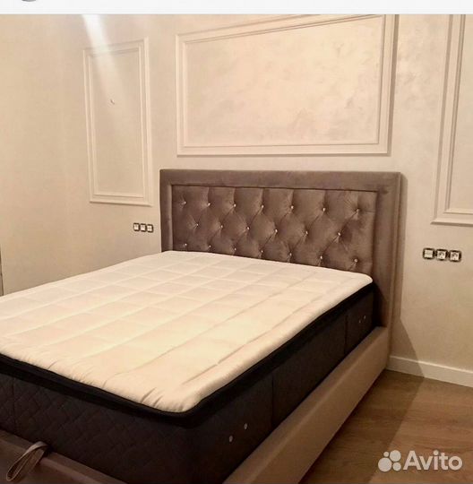 Кровать с подъемным механизмом