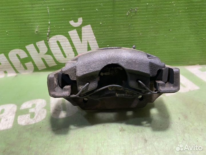 Суппорт тормозной передний левый Ford Fusion JU