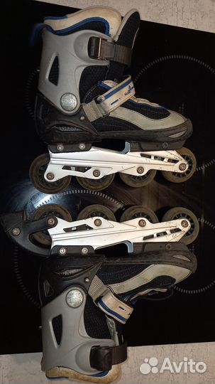 Роликовые коньки