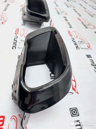 Черные насадки на выхлоп на BMW X6 G06