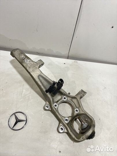 Кулак передний левый Мерседес x166 w166 GL GLS