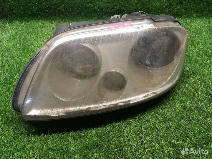 Фара левая Volkswagen Touran