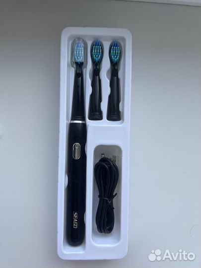 Электронная зубная щетка