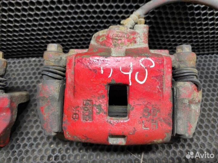 Суппорт передний правый передний Kia Shuma 2