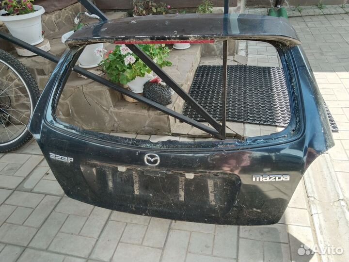 Дверь багажника mazda 323f