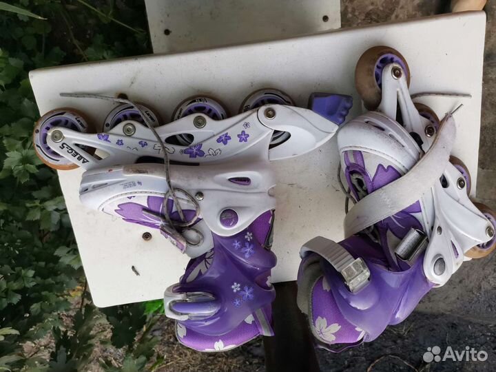 Роликовые коньки