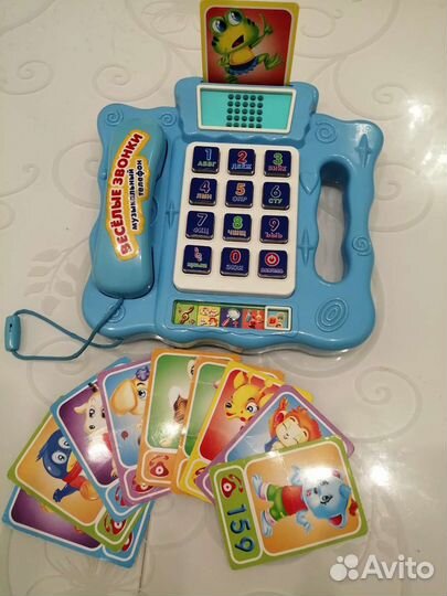 Развивающий и обучающий.музыкальный телефон