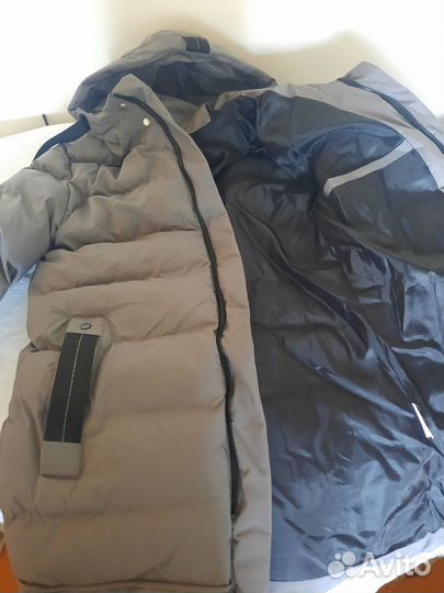 Легкий пуховик новый