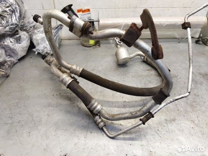 Трубка кондиционера Kia Rio II G4EE 1.4 2008