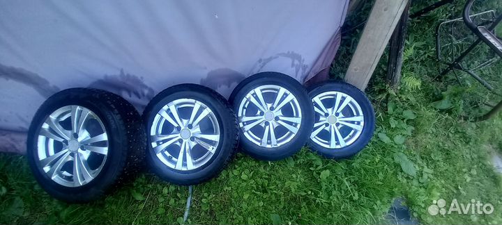 Литые диски с зимней резиной р-14