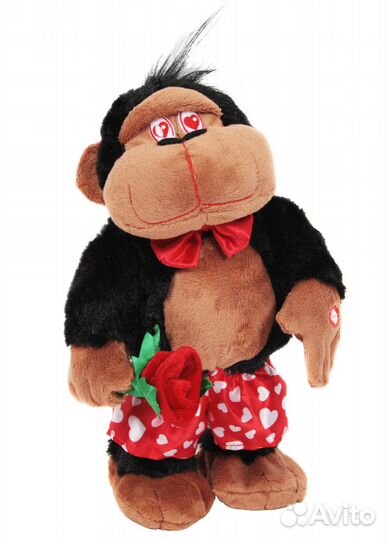 Игрушка -обезьянка очень весёлая