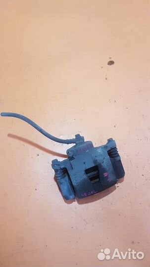 Суппорт тормозной передний Chevrolet Lanos