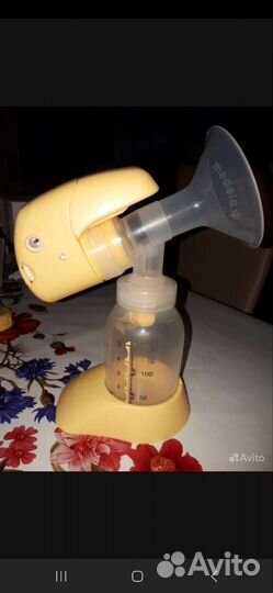 Молокоотсос medela электрический