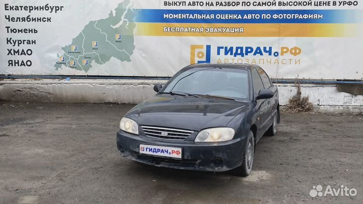 Накладка декоративая на торпедо центральная Kia Spectra (SD) 0K2N15542002