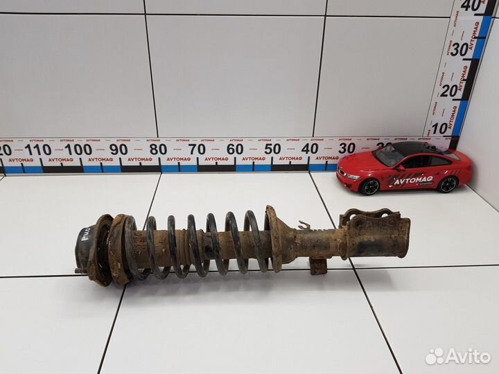 Амортизатор передний правый с пружиной (Kia Rio)