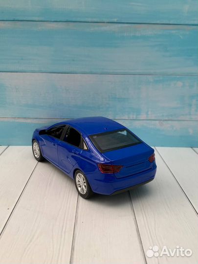 Модель автомобиля LADA Vesta металл 1:24