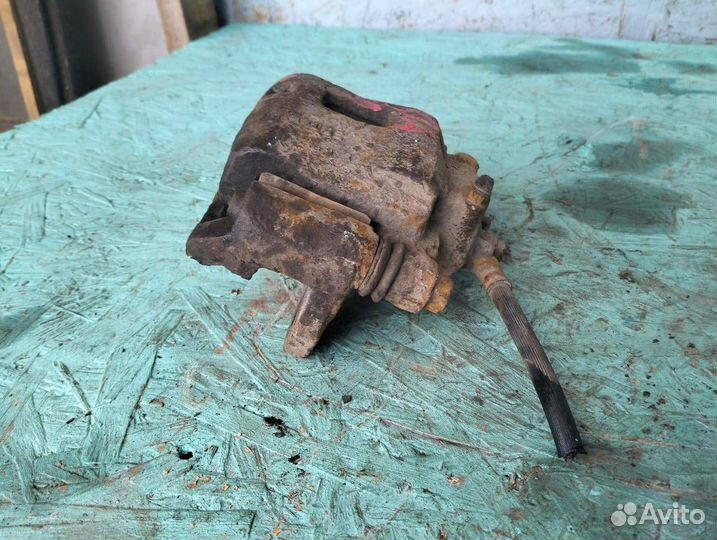 Суппорт передний левый KiaRio 1 рестайлинг