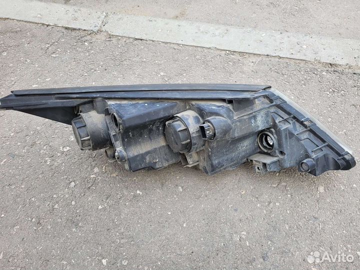 Фара головного света KIA Sportage 3 Левая оригинал