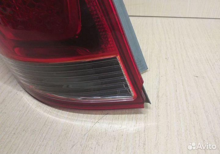 Фонарь левый внешний Kia Rio 3 седан