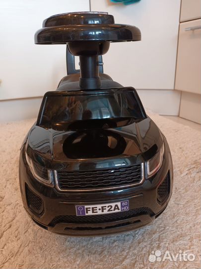 Машинка-каталка со светом и звуком новая