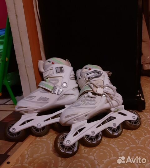 Роликовые коньки