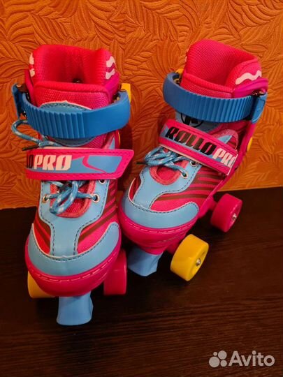 Роликовые коньки