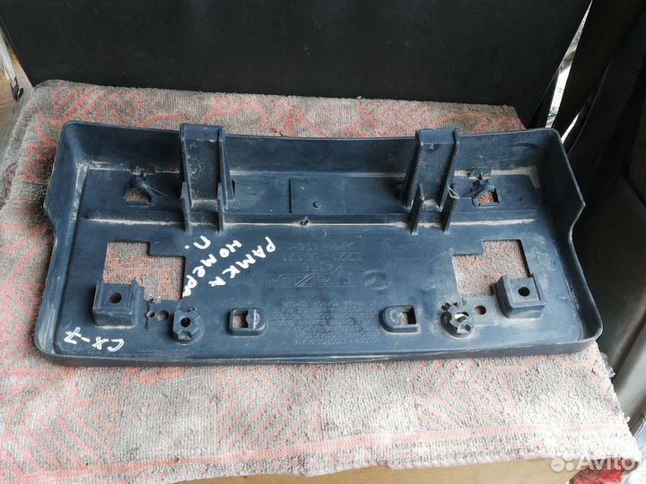 Панель крепления номерного знака Мазда CX-7