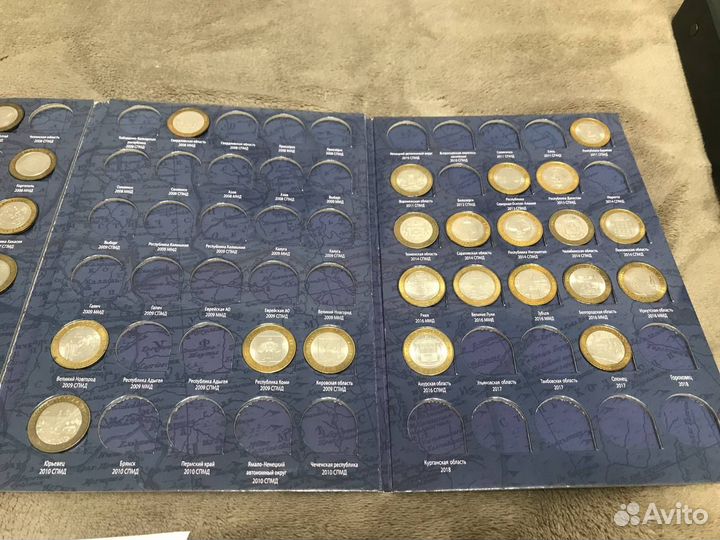 Коллекция монет в альбомах