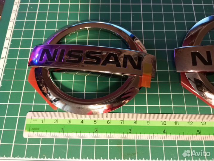 Эмблема Nissan
