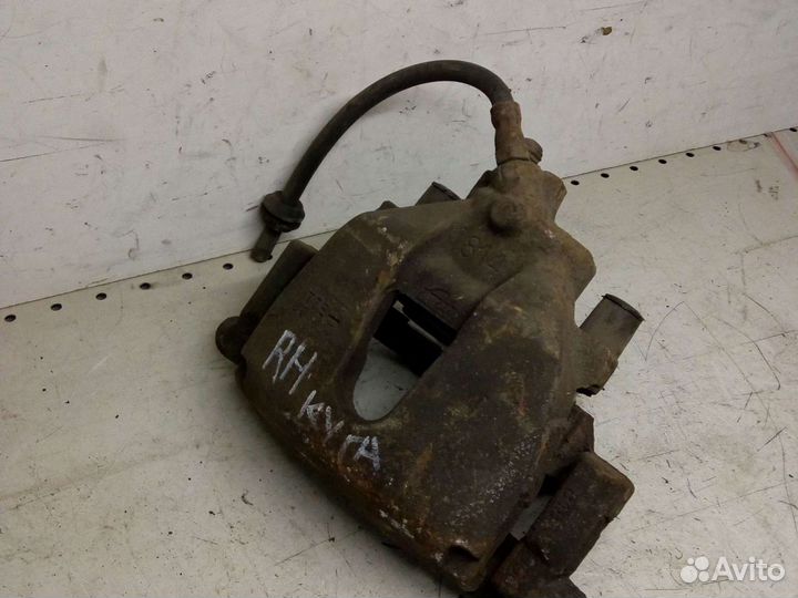 Суппорт тормозной передний правый Форд Куга