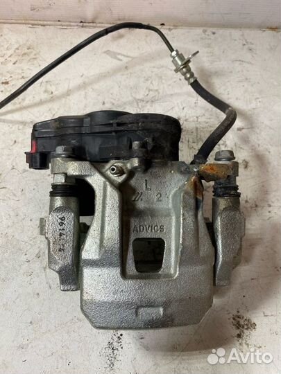 Суппорт тормозной задний левый Mitsubishi