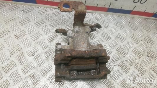 Суппорт тормозной задний правый toyota avensis T27